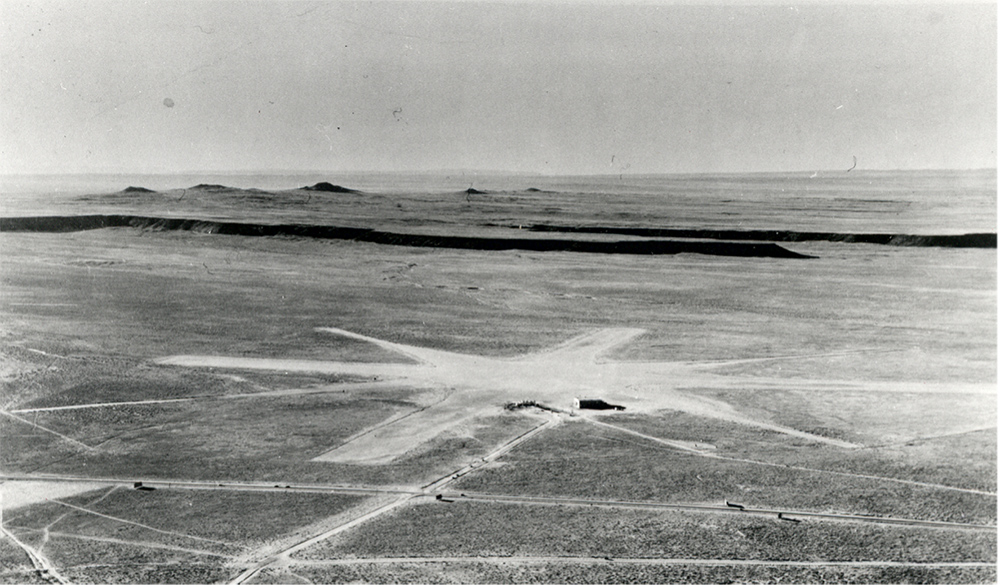 An aerial view of the West Mesa Airport with its three runways creating a star-like pattern.