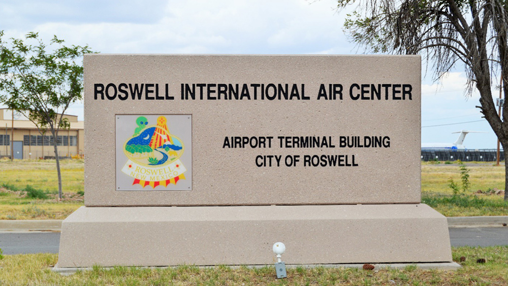 <br />
     The Roswell International Air Center (RIAC) is a commercial airport serving Roswell and Artesia as well Chavez County, New Mexico. The airport is monitored by a control tower and is classified as Class-D. Many other aviation related businesses are also located on the grounds of RIAC and the field is used for storage of hundreds of retired and idled aircraft. RIAC saw a tremendous surge of stored aircraft during the COVID-19 pandemic in 2020 and 2021.  The airport currently receives air service by American Airlines affiliate American Eagle with regional jet flights to Dallas/Fort Worth and Phoenix. The airport also sees passenger traffic from Eddy and Lincoln counties in southeast New Mexico including the cities of Carlsbad and Ruidoso.<br />
     RIAC opened in late 1967 on the site of the former Walker Air Force Base, a 4600-acre military installation located five miles south of Roswell which had closed on June 30, 1967. Originally called the Roswell Industrial Air Center, the airfield was renamed to the Roswell International Air Center by 2005.  The current air terminal was opened in 1975. Walker Air Force Base, which opened in 1941 as the Roswell Army Airfield, was home to the largest United States Air Force Strategic Air Command when it was closed during a round of base closings due to expenses culminating from Vietnam War.<br />
