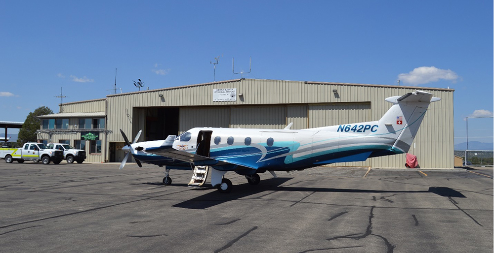 Sierra Blanca airport terminal and hanger with an Air Methods, Native Air ambulance Pilatus PC-12.